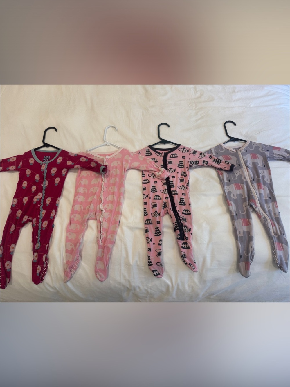 Four KicKee Pants onesies size 3 to 6 months